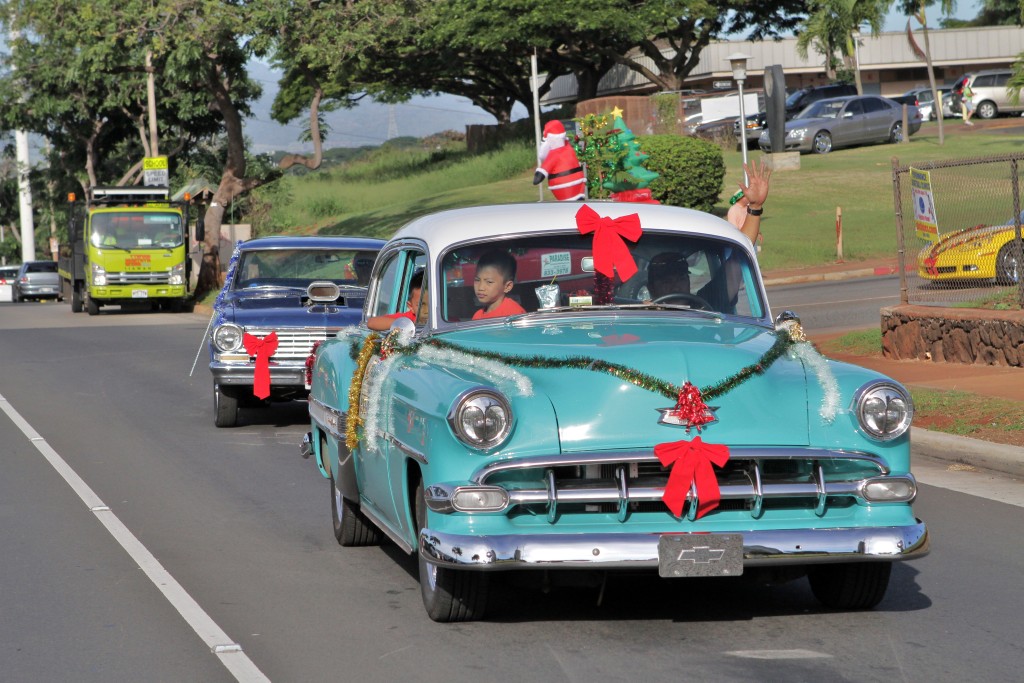 Cars decked out for Christmas in the 2013 'Aiea Christmas Parade